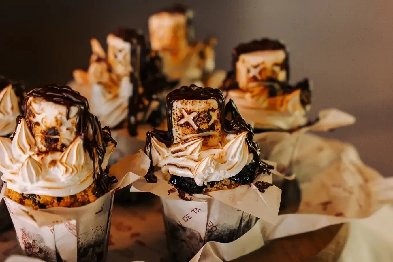 Halloween cupcakes topped with toasted meringue and chocolate at KU DE TA.