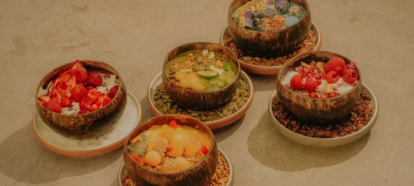 Frozen bowls of fresh fruit served in coconut shells at Alunê, the beach club at W Bali in Seminyak.