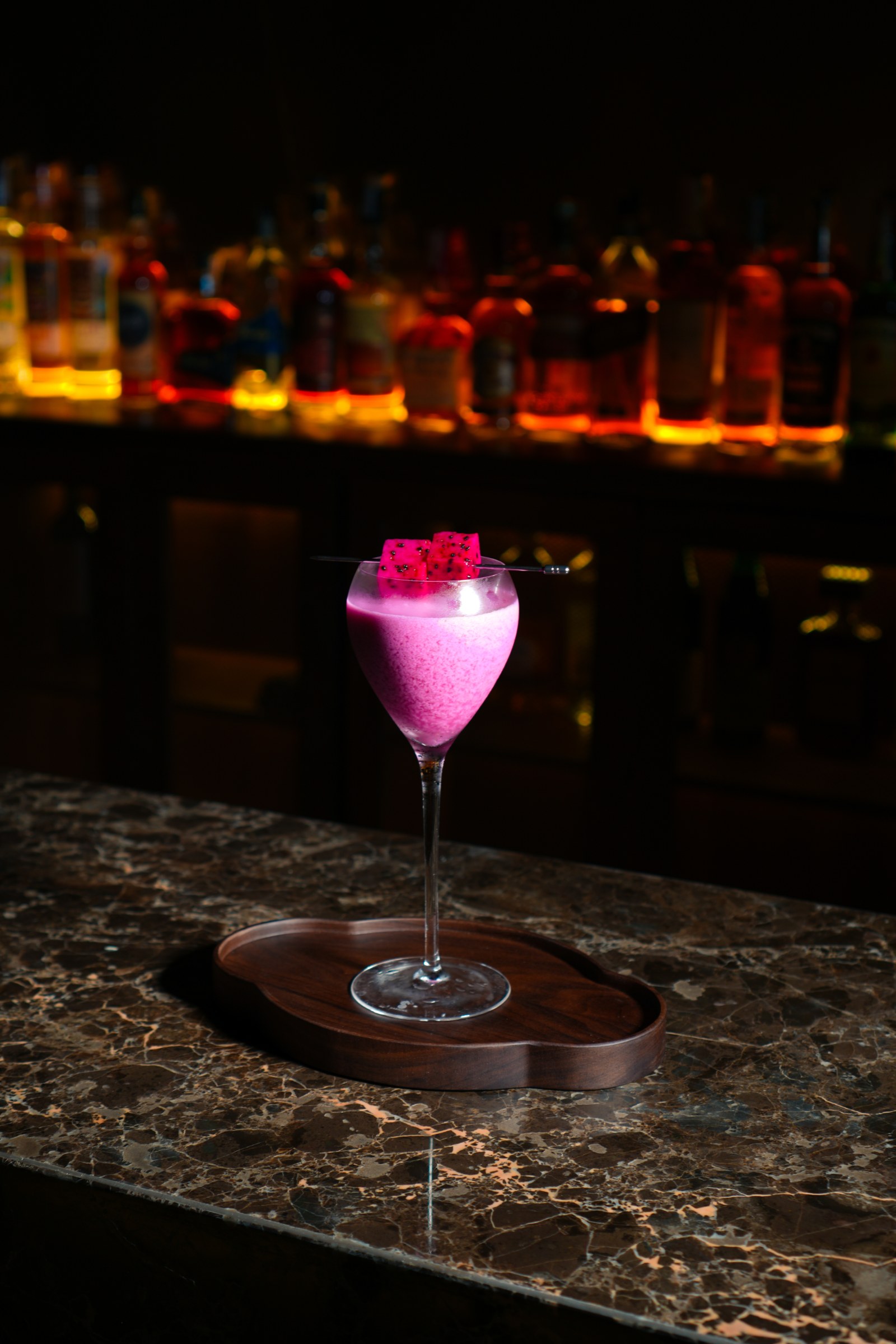 A foam-topped signature cocktail at Bar Rasa.