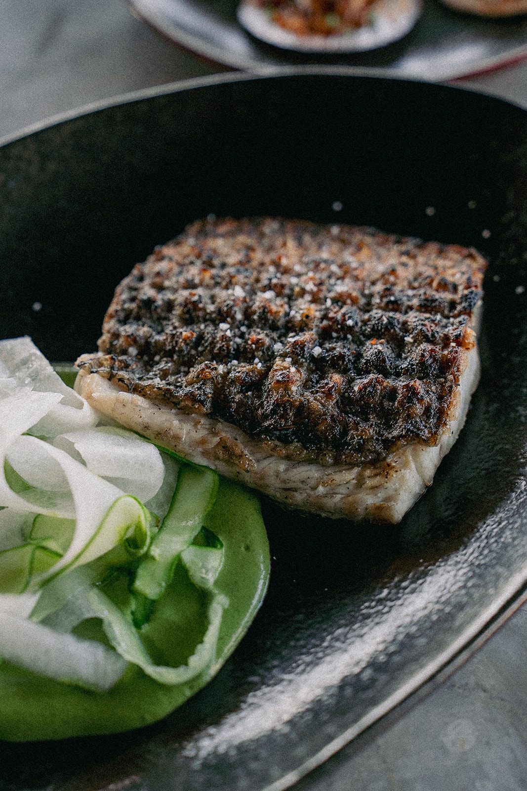 Charred fish served at burnt in Uluwatu.